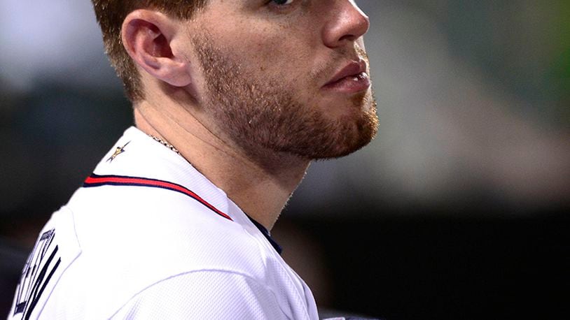 Braves' Freeman cleared to swing