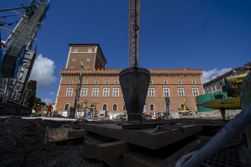 A view of the construction site of the new 25.5-kilometer Metro C subway main hub in Piazza Venezia in central Rome, Thursday, May 23, 2024. During a tour Thursday of the construction site at Piazza Venezia, chief engineer Andrea Sciotti said works on the nearly 3 billion euro project, considered one of the most complicated in the world, were running at pace to be completed by 2034. (AP Photo/Domenico Stinellis)