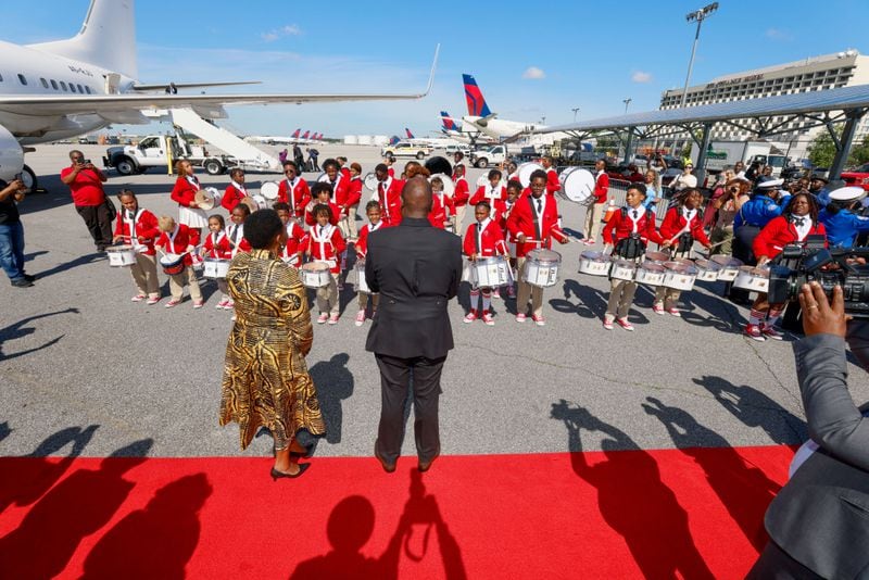 Kenya's President William Ruto and first lady Rachel Ruto, observe the Atlanta Drum Academy perform as they arrive at Hartsfield-Jackson Atlanta International Airport on Monday, May 20, 2024, for a state visit. His work agenda includes visits to the CDC, MLK museum, Coca-Cola, Carter Center, and Tyler Perry Studios.
(Miguel Martinez / AJC)