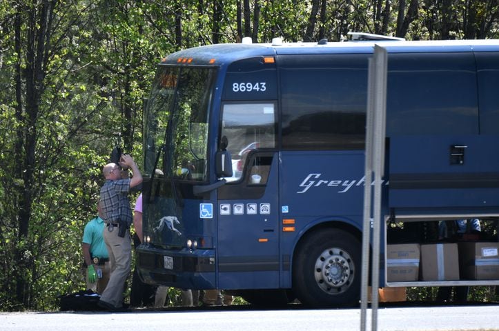 I-85 shut down as Gwinnett SWAT surrounds bus with armed man aboard