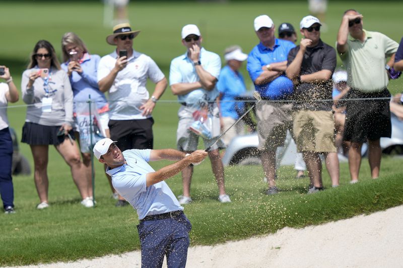 Scottie Scheffler hits out of a sand trap on the ninth hole during the first round of the Charles Schwab Challenge golf tournament at Colonial Country Club, Thursday, May 23, 2024, in Fort Worth, Texas. (AP Photo/LM Otero)