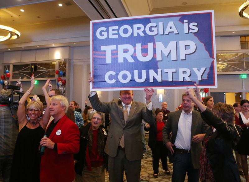 November 8,  2016, ATLANTA: Republican voters celebrate as it is projected Trump wins Georgia at the Republican Watch party at the Grand Hyatt, Buckhead, on Tuesday, Nov. 7, 2016, in Atlanta.    Curtis Compton /ccompton@ajc.com