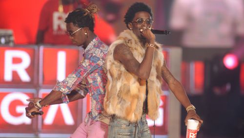 Rappers Young Thug (left) and Rich Homie Quan perform onstage during the BET Hip Hop Awards 2014 at Boisfeuillet Jones Atlanta Civic Center on September 20, 2014 in Atlanta. (Brad Barket/Getty Images for BET)