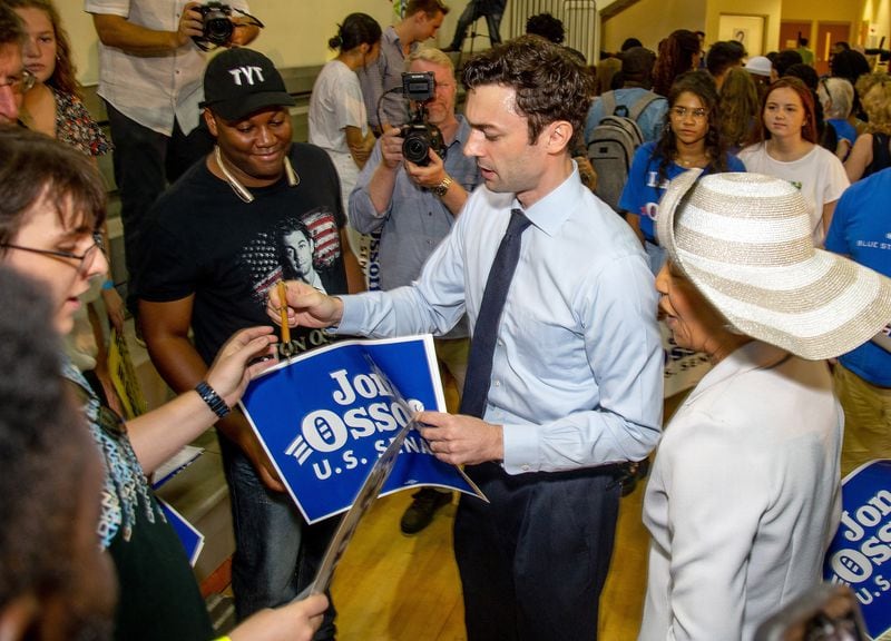 Jon Ossoff , Democratic candidate for one of Georgia's U.S. Senate seats, signs autographs during a  voter registration rally at the MLK Recreation Center in Atlanta on  Saturday, September 28, 2019. (Photo: STEVE SCHAEFER / SPECIAL TO THE AJC)