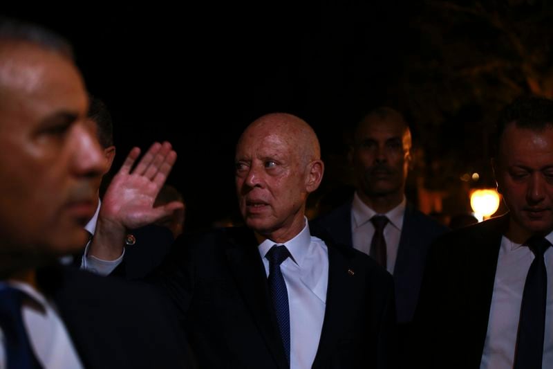 Tunisian president and candidate for re-election Kais Saied joins his supporters after the announcement of the provisional results for the presidential elections, in the capital Tunis, Tunisia, Sunday, Oct. 6, 2024. (AP Photo/Anis Mili)