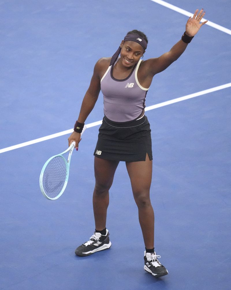 Coco Gauff of the United States celebrates after defeating Paula Badosa of Spain in a women's singles semi-final match for the China Open tennis tournament at the National Tennis Center in Beijing, Saturday, Oct. 5, 2024. (AP Photo/Achmad Ibrahim)