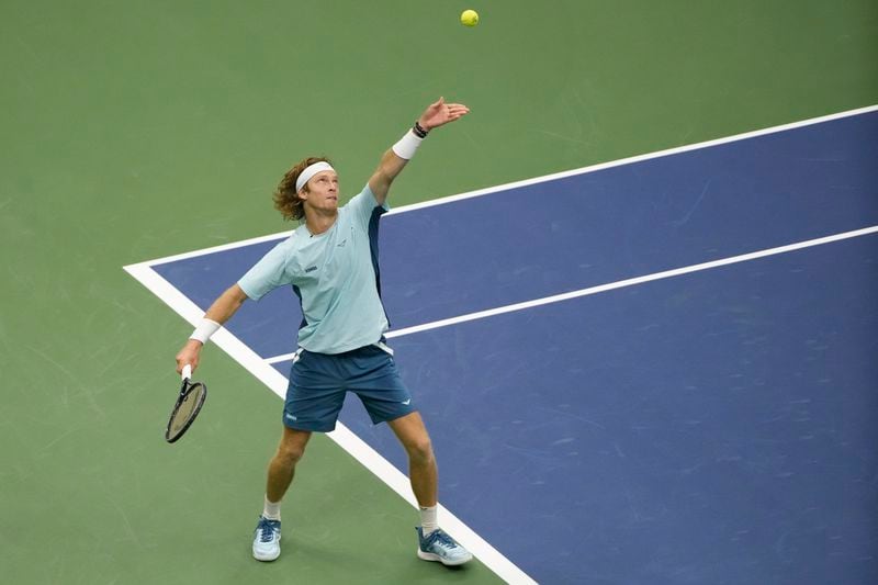 Andrey Rublev, of Russia, serves to Grigor Dimitrov, of Bulgaria, during the fourth round of the U.S. Open tennis championships, Sunday, Sept. 1, in New York. 2024. (AP Photo/Pamela Smith)