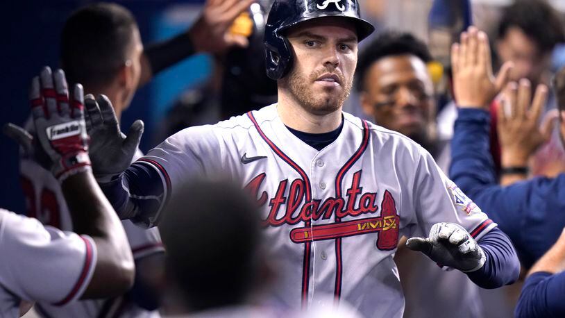 New All-Star Freeman drives in four to lift Braves