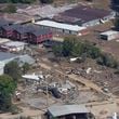 A view of damage in Asheville, N.C., is seen during an aerial tour with President Joe Biden who looked at areas impacted by Hurricane Helene near Asheville, N.C., Wednesday, Oct. 2, 2024. (AP Photo/Susan Walsh)