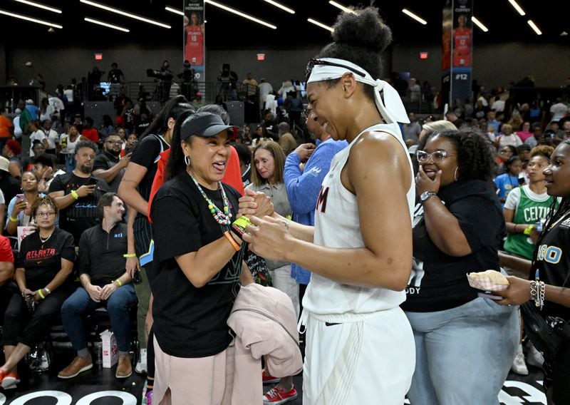 South Carolina Women's Basketball Coach Dawn Staley and Atlanta Dream guard Allisha Gray greet at the Gateway Center Arena on July 2, 2024, in Atlanta. Chicago Sky won 85-77 over Atlanta Dream. (Hyosub Shin / AJC)t