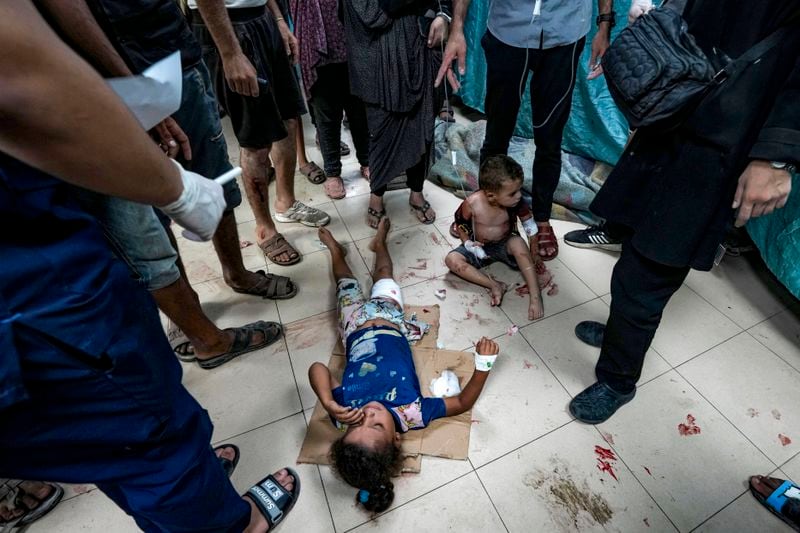 Palestinian children wounded in the Israeli bombardment of the Gaza Strip are treated in a hospital in Deir al-Balah, Thursday, Sept. 5, 2024. (AP Photo/Abdel Kareem Hana)