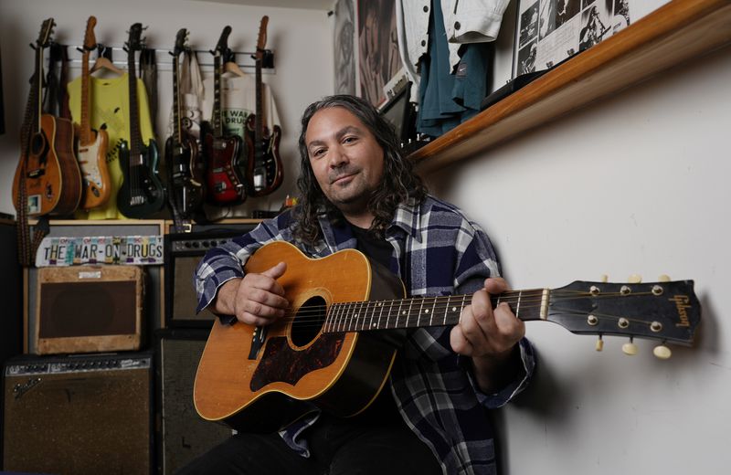 Adam Granduciel, leader of the band The War on Drugs, poses for a portrait at his studio on Monday, Aug. 26, 2024, in Burbank, Calif. (AP Photo/Chris Pizzello)