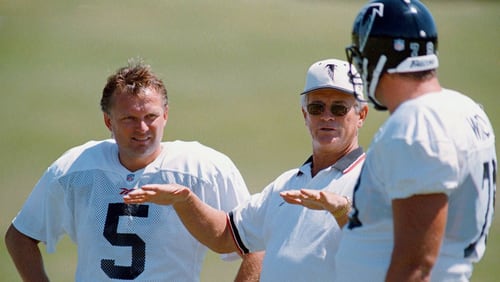 Atlanta Falcons coach Dan Reeves, center, breaks it down for kicker Morten Andersen (5), and center Dave Widell, right, during one long ago 1998 practice. (AP Photo/Erik S. Lesser)