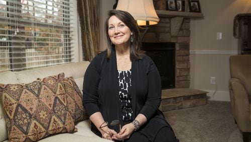 Bonnie Shekarabi poses for a portrait at her Clayton County residence. Bonnie and her family moved from the Johns Creek community two and a half years ago. She enjoys the diversity in Jonesboro and iis one of many who are taking advantage of the county’s proximity to the airport, cheaper home prices and quicker access to downtown Atlanta at a time when the metro is becoming more gridlocked. ALYSSA POINTER/ALYSSA.POINTER@AJC.COM