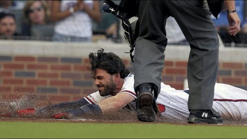 <p>
              Atlanta Braves' Nick Markakis hits a two-run line drive single to right field during the first inning of a baseball game against the Washington Nationals, Sunday, July 21, 2019, in Atlanta. (AP Photo/John Amis)
            </p> <p>
              Atlanta Braves Dansby Swanson slides safely into home plate on a hit against the Kansas City Royals during the first inning of a baseball game Tuesday, July 23, 2019, in Atlanta. (AP Photo/Tami Chappell)
            </p>