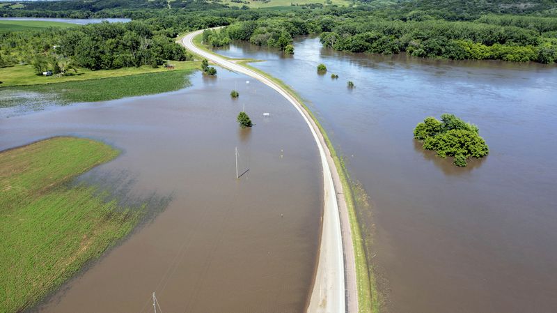 Highway 18 is underwater after days of heavy rain led to flooding in the area, Saturday, June 22, 2024 in Canton, S.D.. (AP Photo/Josh Jurgens)