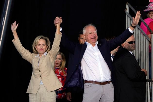 Democratic vice presidential nominee Minnesota Gov. Tim Walz is introduced with his wife Gwen during a campaign stop at Laborfest Monday, Sept. 2, 2024, in Milwaukee. (AP Photo/Morry Gash)