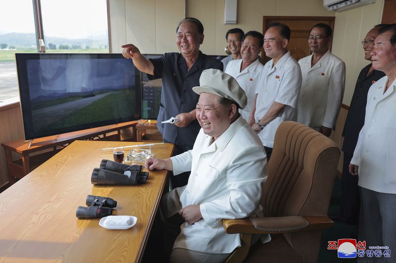 In this photo provided by the North Korean government, its leader Kim Jong Un inspects a demonstration of what it says a drone crashing into a target at an undisclosed location in North Korea, Saturday, Aug. 24, 2024. Independent journalists were not given access to cover the event depicted in this image distributed by the North Korean government. The content of this image is as provided and cannot be independently verified. Korean language watermark on image as provided by source reads: "KCNA" which is the abbreviation for Korean Central News Agency. (Korean Central News Agency/Korea News Service via AP)