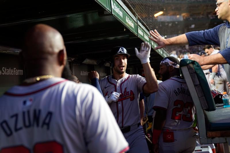 Atlanta Braves' Matt Olson celebrates his home run during the seventh inning of a baseball game against the Chicago Cubs, Wednesday, May 22, 2024, in Chicago. (AP Photo/Erin Hooley)
