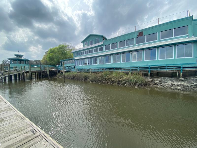 The Fish Dock Bar & Grill in Townsend offers beautiful views of the Sapelo River. Glass windows separating the restaurant from the adjacent Sapelo Sea Farm processing facility provide a glimpse of how seafood is sized and graded. LIGAYA FIGUERAS / LIGAYA.FIGUERAS@AJC.COM