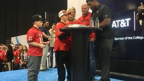 After three hours, the Wright family got to meet UGA legend Herschel Walker. Photo: Jennifer Brett