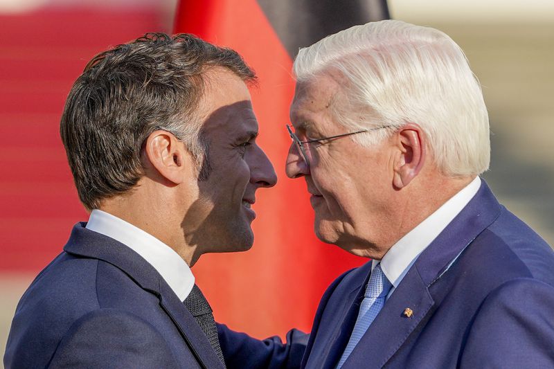 German President Frank-Walter Steinmeier, right, and French President Emmanuel at the end of a press conference at Bellevue Place in Berlin, Germany, Sunday, May 26, 2024. (AP Photo/Markus Schreiber)