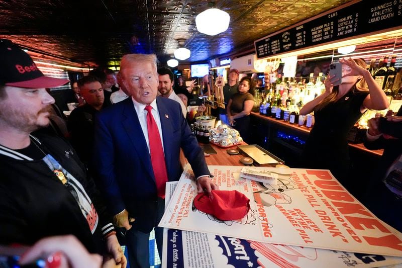 Republican presidential nominee former President Donald Trump makes a campaign stop at Pubkey Bar and Media House, Wednesday, Sept.18, 2024, in New York. (AP Photo/Alex Brandon)