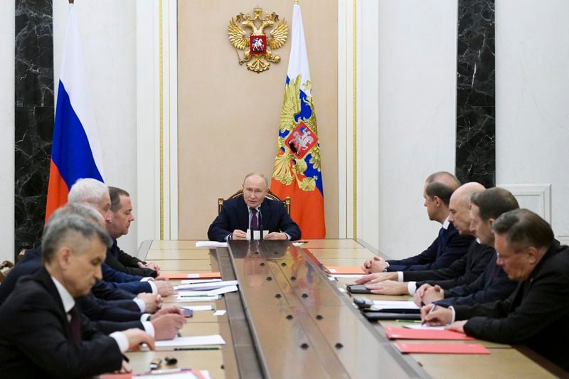 Russian President Vladimir Putin, center, speaks at the Security Council meeting on nuclear deterrence at the Kremlin (Alexei Nikolsky, Sputnik, Kremlin Pool Photo via AP)