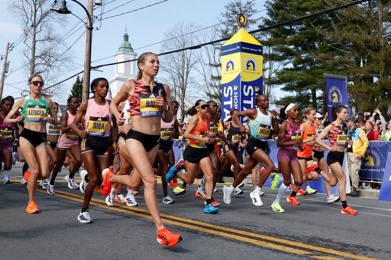 FILE - Elite female runners break from the start line of the Boston Marathon, Monday, April 15, 2024, in Hopkinton, Mass. (AP Photo/Mary Schwalm, File)