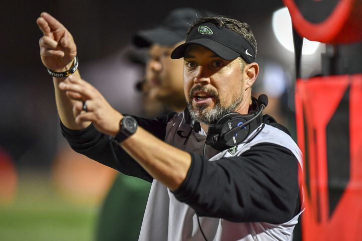 Collins Hill head coach Drew Swick calls a play during the second half of the game Friday, Nov. 10, 2023 at North Cobb High School. (Daniel Varnado/For the AJC)