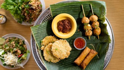 Snackboxe Bistro appetizer plate with egg rolls, Khao Chee, and meatballs. CONTRIBUTED BY MIA YAKEL