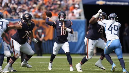 Chicago Bears quarterback Caleb Williams passes during the first half of an NFL football game against the Tennessee Titans on Sunday, Sept. 8, 2024, in Chicago. (AP Photo/Erin Hooley)