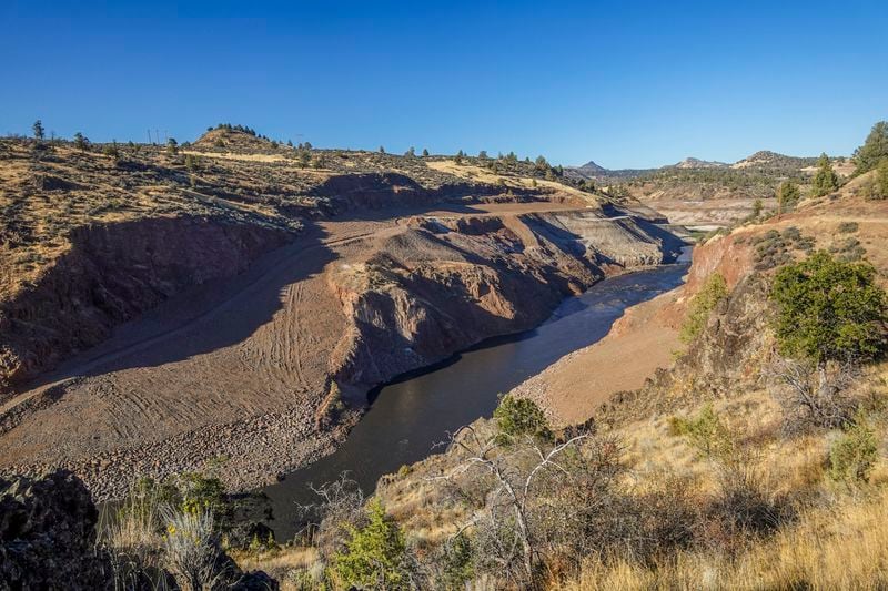 In this image provided by Swiftwater Films shows water flowing down the Klamath River where the Iron Gate Dam once stood near Hornbrook, Calif., Tuesday, Oct. 1, 2024. (Swiftwater Films via AP)