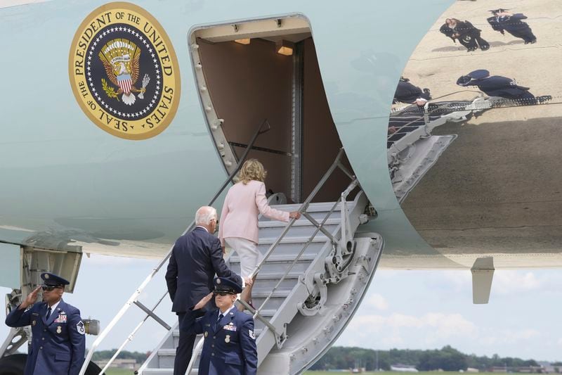 President Joe Biden and first lady Jill Biden board Air Force One as they arrive to depart, Tuesday, Aug. 13, 2024, at Joint Base Andrews, Md., en route to New Orleans. (AP Photo/Mark Schiefelbein)