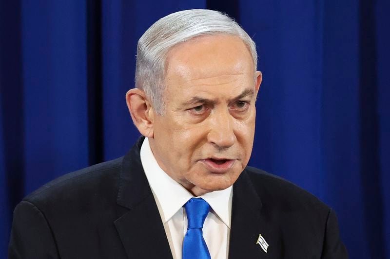 Israeli Prime Minister Benjamin Netanyahu speaks during a press conference in Tel Aviv, Israel, Saturday July 13, 2024. (Nir Elias/Pool Photo via AP)