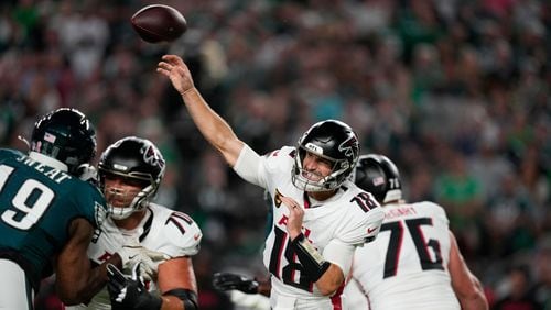 Atlanta Falcons quarterback Kirk Cousins (18) throws during the first half of an NFL football game against the Philadelphia Eagles on Monday, Sept. 16, 2024, in Philadelphia. (AP Photo/Matt Slocum)