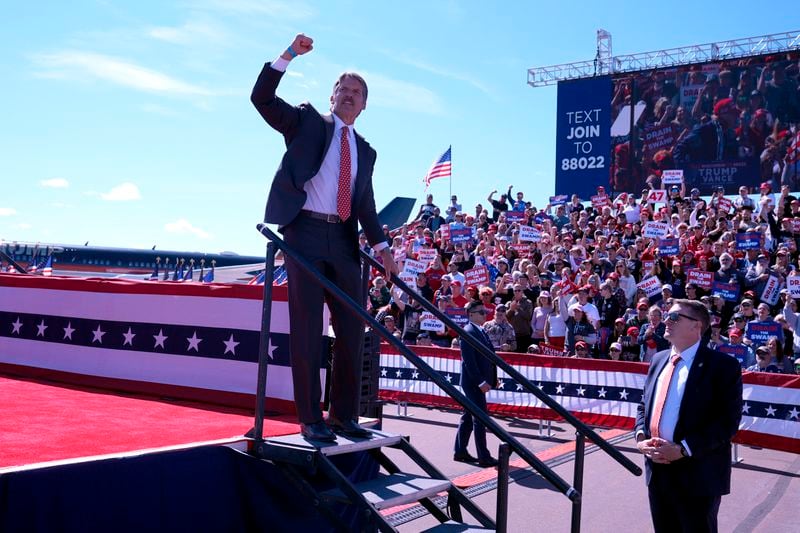 Republican Senate candidate Eric Hovde gestures after speaking at a campaign event for Republican presidential nominee former President Donald Trump at Central Wisconsin Airport, Saturday, Sept. 7, 2024, in Mosinee, Wis. (AP Photo/Alex Brandon)