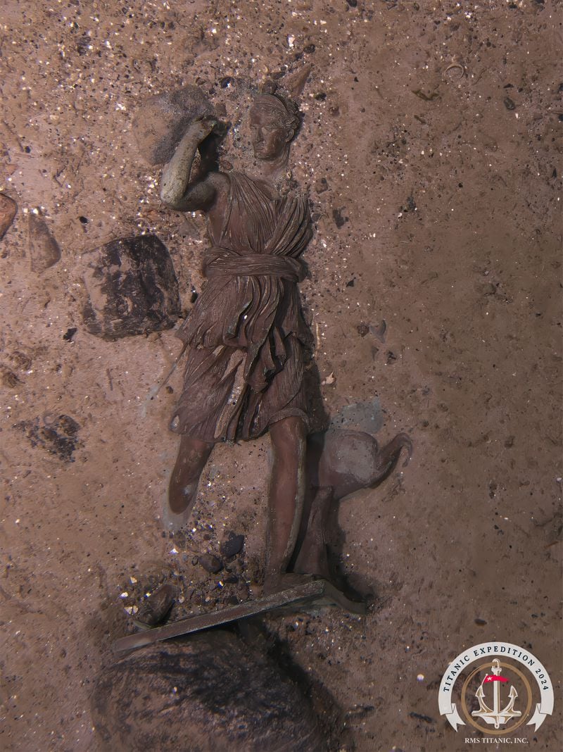 This is a photograph of a bronze statuette of the Roman goddess Diana that was found among the wreckage of the Titanic during a July 2024 expedition.