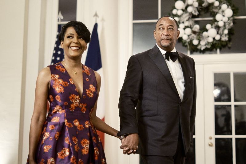 Keisha Lance Bottoms, the former mayor of Atlanta, and Derek Bottoms arrive for a state dinner during the visit of President Emmanuel Macron of France, at the White House in Washington on Thursday, Dec.1, 2022. (T.J. Kirkpatrick/The New York Times)