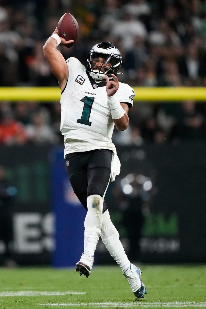 Philadelphia Eagles quarterback Jalen Hurts (1) passes against the Green Bay Packers during the first half of an NFL football game, Friday, Sept. 6, 2024, at the Neo Quimica Arena in Sao Paulo. (AP Photo/Doug Benc)