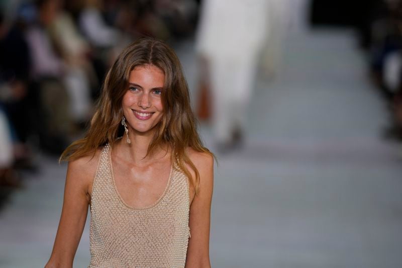 A model walks the runway during the Ralph Lauren Spring/Summer 2025 fashion show as part of New York Fashion Week on Thursday, Sept. 5, 2024, at Khalily Stables in Bridgehampton, N.Y. (Photo by Charles Sykes/Invision/AP)