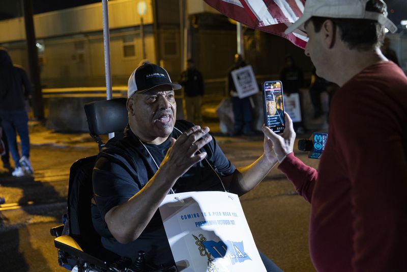 Boise Butler, president of ILA Local 1291, speaks to the press outside the Packer Avenue Marine Terminal Port in Philadelphia, Tuesday, Oct. 1, 2024. (AP Photo/Ryan Collerd)