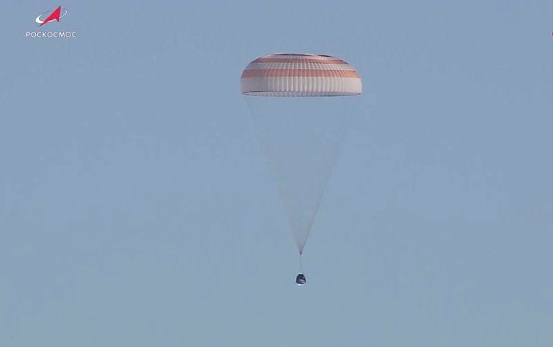 In this photo taken from video released by Roscosmos space corporation, Russian Soyuz MS-25 space capsule carrying the NASA astronaut Tracy Dyson and the Roscosmos cosmonauts Oleg Kononenko and Nikolai Chub descends south-east of the Kazakh town of Zhezkazgan, Kazakhstan, Monday, Sept. 23, 2024. (Roscosmos space corporation via AP)