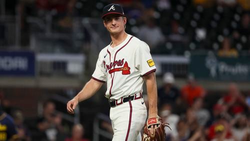 Atlanta Braves outfielder Luke Williams reacts after pitching in relief during the ninth inning against the Milwaukee Brewers at Truist Park, Tuesday, August 6, 2024, in Atlanta. The Braves lost 10-0. (Jason Getz / AJC)
