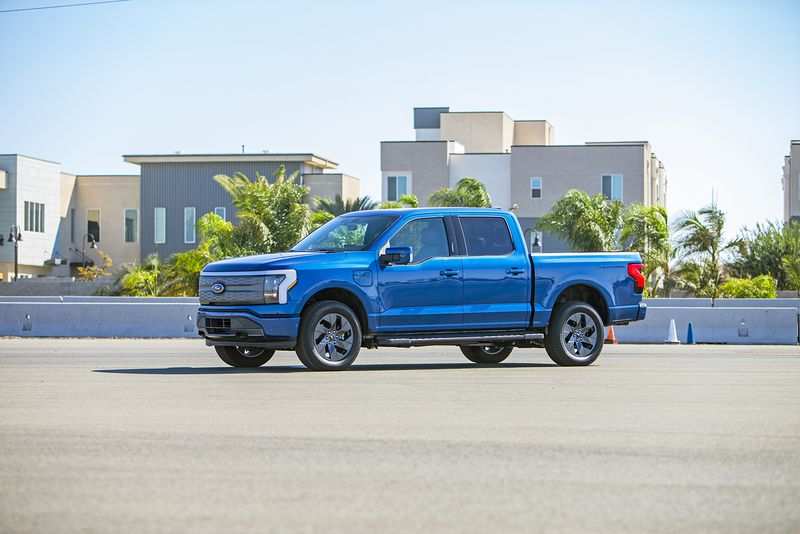 This photo provided by Edmunds shows the 2022 F-150 Lightning. The F-150 Lightning is one of the most practical and job site-friendly trucks on sale today. (Courtesy of Edmunds via AP)