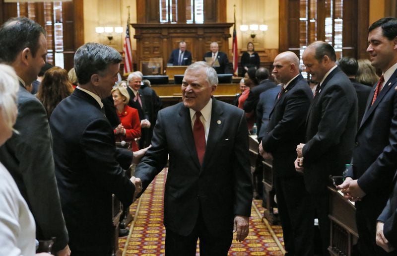 Gov. Nathan Deal greats lawmakers after delivering his 2017 State of the State address in January before a joint session of the Georgia General Assembly.