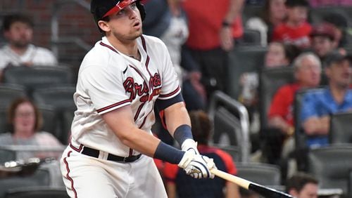 May 19, 2021 Atlanta - Atlanta Braves third baseman Austin Riley (27) hits a doubles in the 8th inning at Truist Park on Wednesday, May 19, 2021. Atlanta Braves won 5-4 over New York Mets. (Hyosub Shin / Hyosub.Shin@ajc.com)