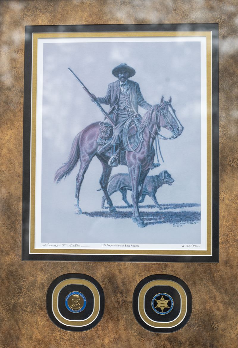 A family painting of Bass Reeves, one of the first Black deputy U.S. marshals west of the Mississippi River. (Alyssa Pointer / Alyssa.Pointer@ajc.com)