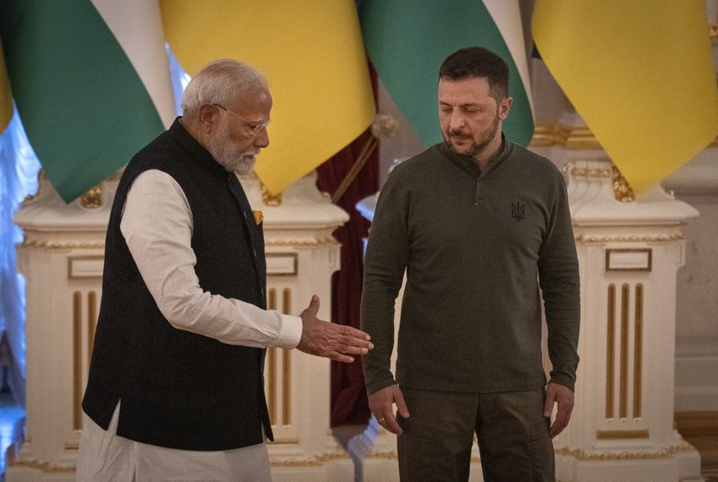 Indian Prime Minister Narendra Modi, left, meets with Ukrainian President Volodymyr Zelenskyy in Kyiv, Ukraine, on Friday, Aug. 23, 2024. (AP Photo/Efrem Lukatsky)