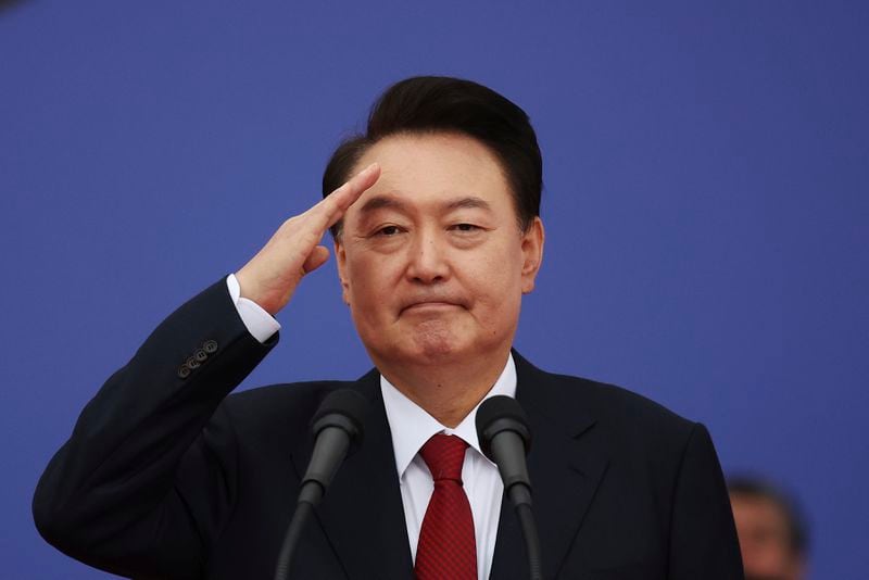 South Korean President Yoon Suk Yeol salutes after delivering his speech during a celebration to mark the 76th anniversary of Korea Armed Forces Day in Seongnam, South Korea Tuesday, Oct. 1, 2024. (Kim Hong-Ji/Pool Photo via AP)